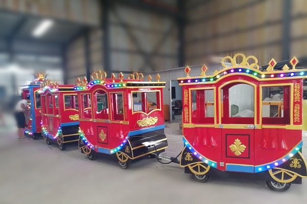 What Floor Conditions and Slopes Should Be Checked Before Operating a Trackless Train Indoors?